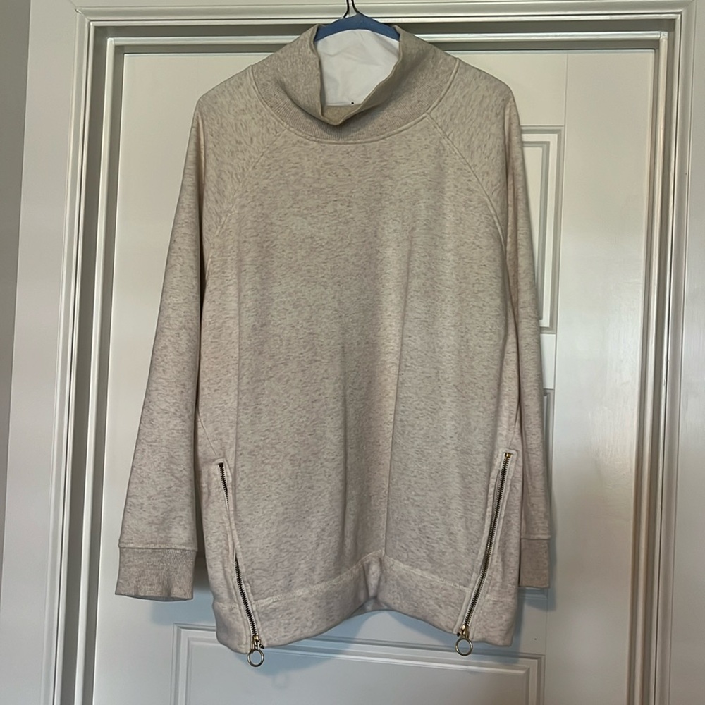 Athleta sweater with zip details in front. Excellent condition